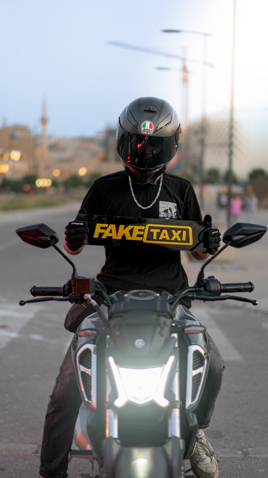 FAKE TAXI — on two wheels